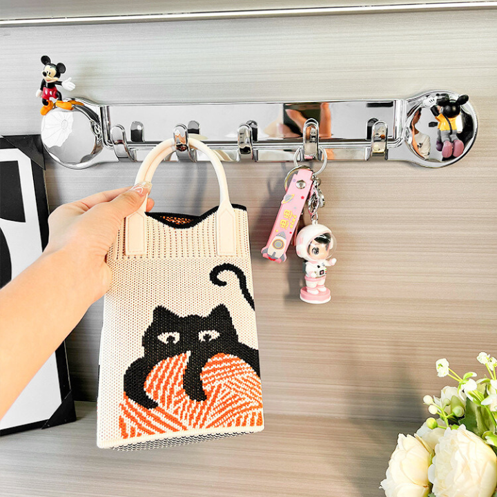 Supporti in acciaio inox con 5 ganci, comodi e capaci di sostenere fino a 20 kg